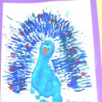 A peacock made with a footprint, painting with a fork